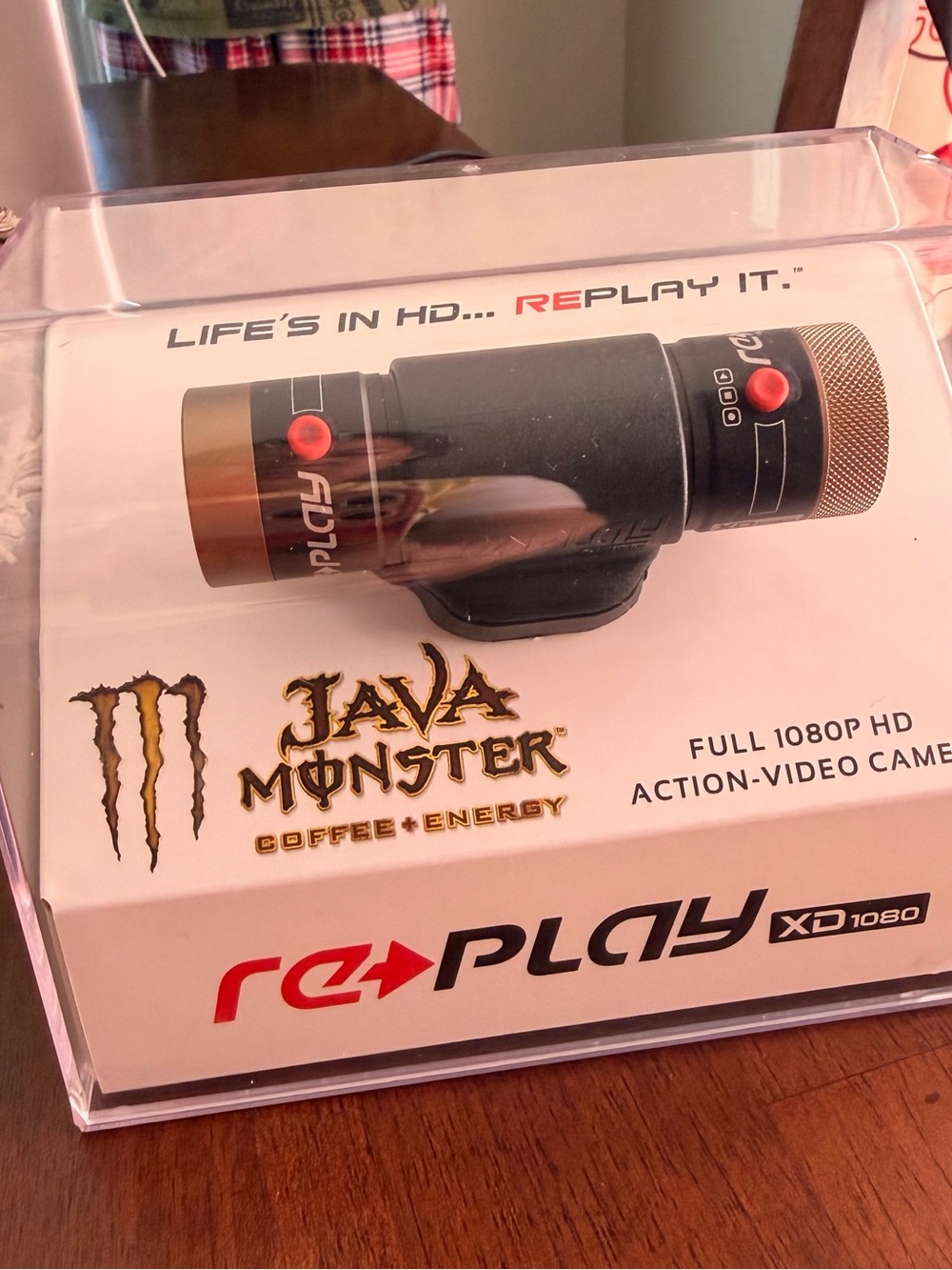 Replay Action Camera with Black Body and Gold Accents